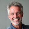 Portrait of David M., a healthy-looking man in his early 50s.
